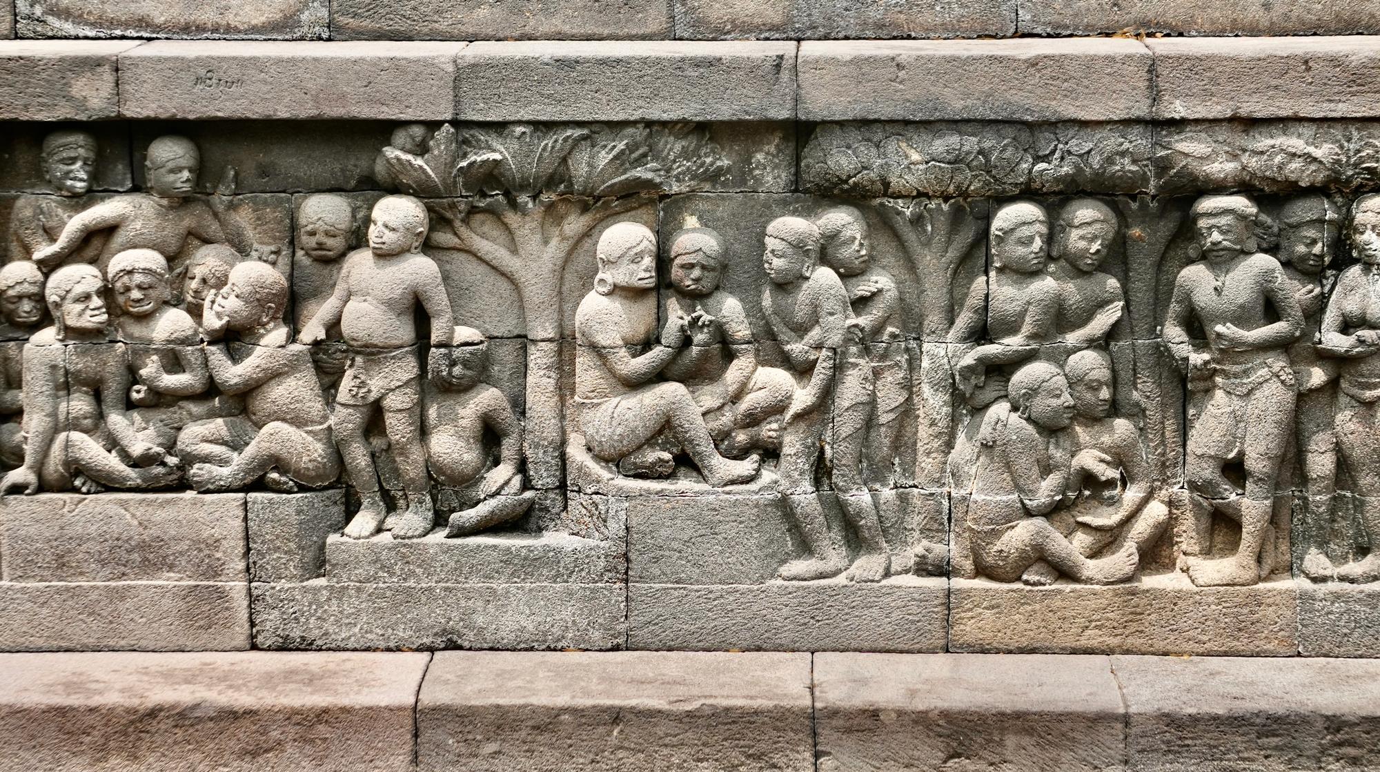 Ordinary people, displayed along the base level of Borobudur