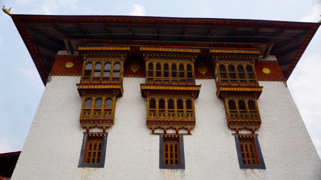 Ornate windows inside the Punakha fortress’s inner courtyard.