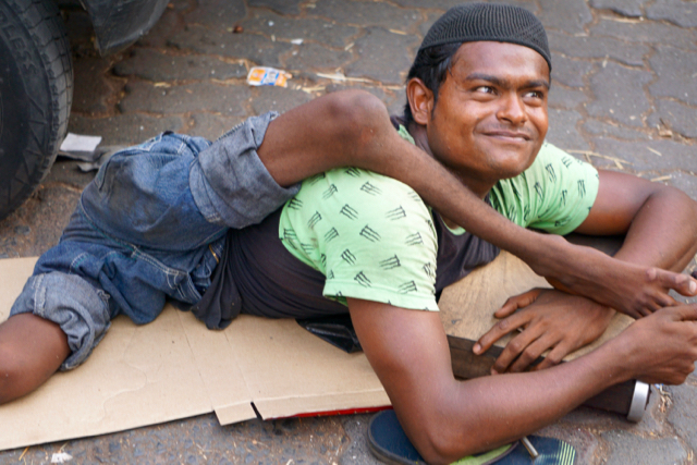 Deformed street beggar.