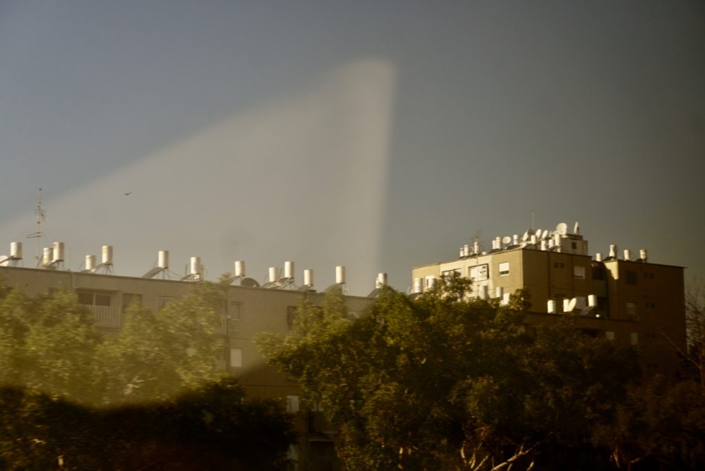 Through the train window: Israeli energy efficiency, every apartment has its own rooftop solar-panel-powered hot water heater