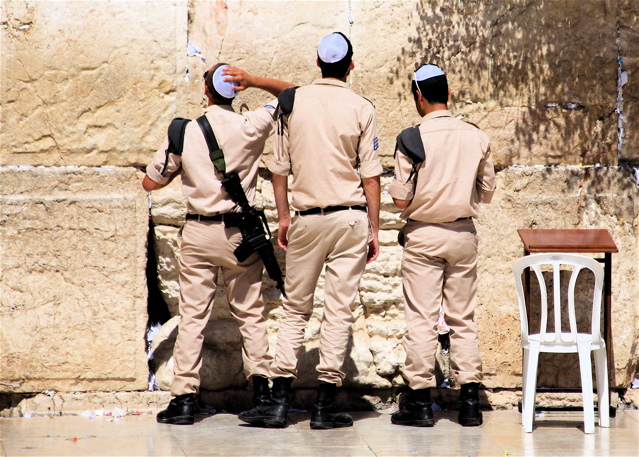 Soldiers Praying at the Wailing Wall.