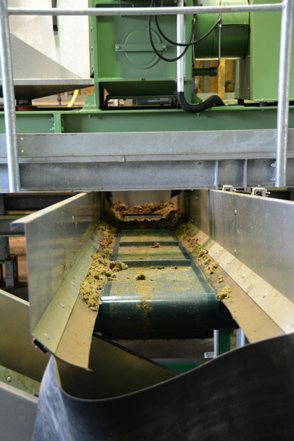 Conveyor belt for biomass powder