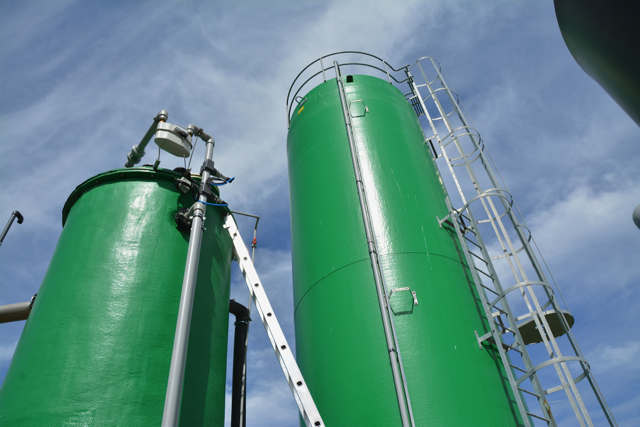 Left tank for biomass fermentation and right tank for methane storage