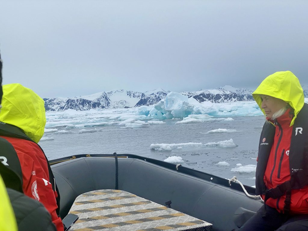 View from the Zodiac. All passengers were given those colorful rain jackets and rubber boots.